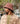 Man wearing rust red cord bucket hat