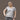 Model (5'8") wearing size L grey V-neck organic cotton t-shirt.