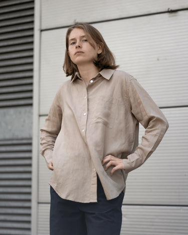 women's khaki linen shirt worn by a model