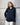 women's navy linen shirt worn by a model