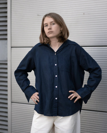 women's navy linen shirt worn by a model