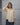 women's yellow linen shirt worn by a model