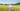 woman with bucket hat in a sunny meadow