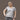 Model (5'8") wearing size L grey V-neck organic cotton t-shirt.