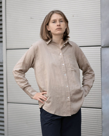 women's khaki linen shirt worn by a model