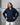 women's navy linen shirt worn by a model