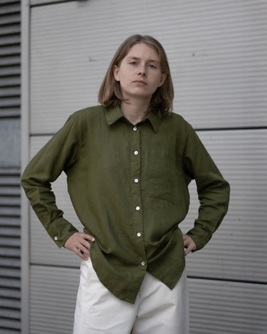 women's olive green linen shirt worn by a model