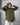 women's olive green linen shirt worn by a model