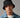 Person wearing a black bucket hat