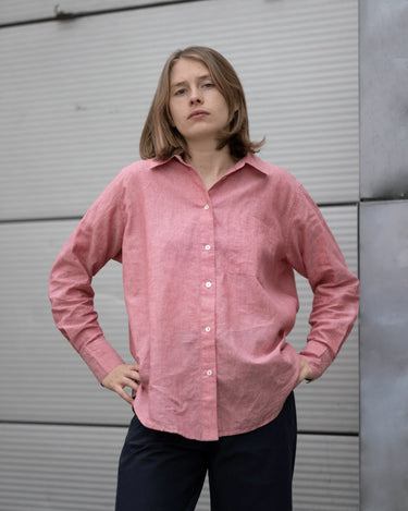 women's coral linen shirt worn by a model