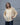 women's yellow linen shirt worn by a model