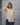 women's yellow linen shirt worn by a model